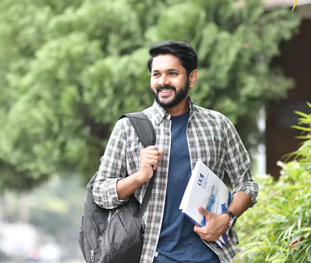 Indian man with backpack